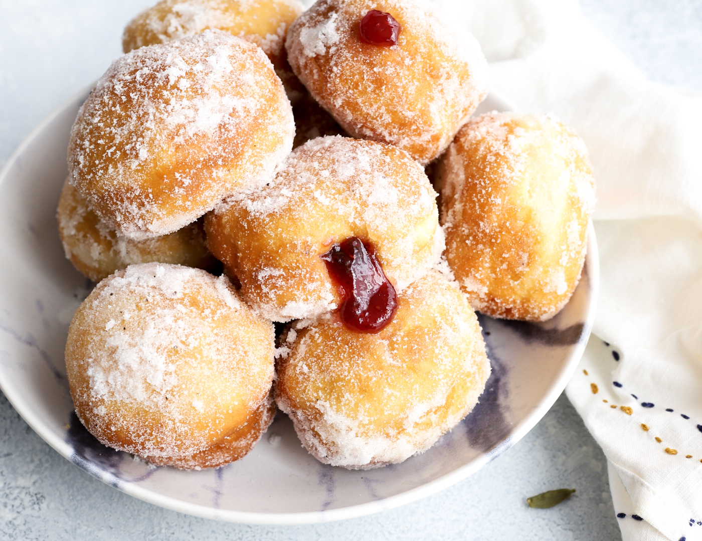 Vegan Raspberry Jam Doughnuts with Cardamom Sugar