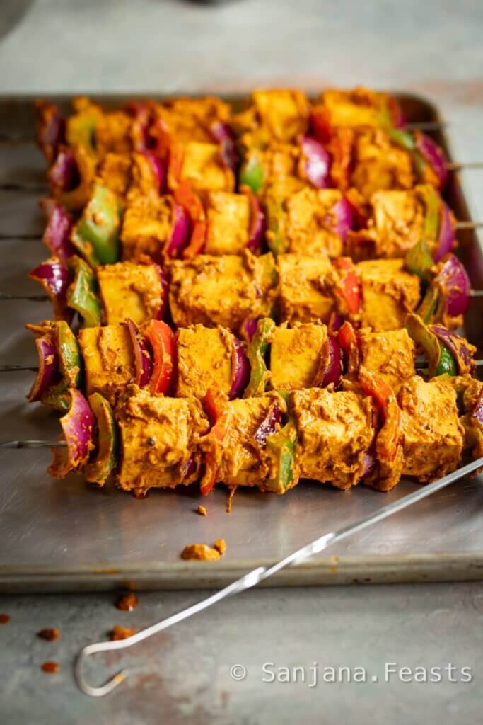 Paneer tikka skewers kebabs ready to cook in oven air fryer or barbecue