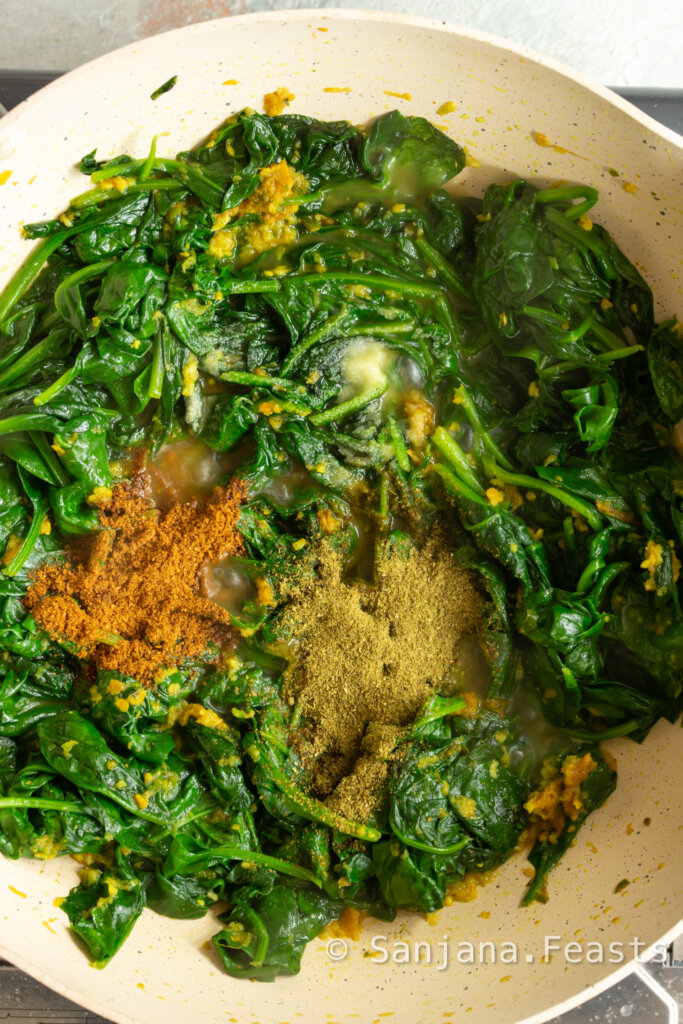 Add the dry masalas for the spinach and mushroom curry