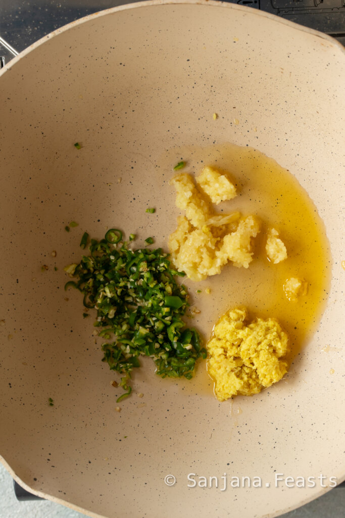 Saute the aromatics for the spinach curry