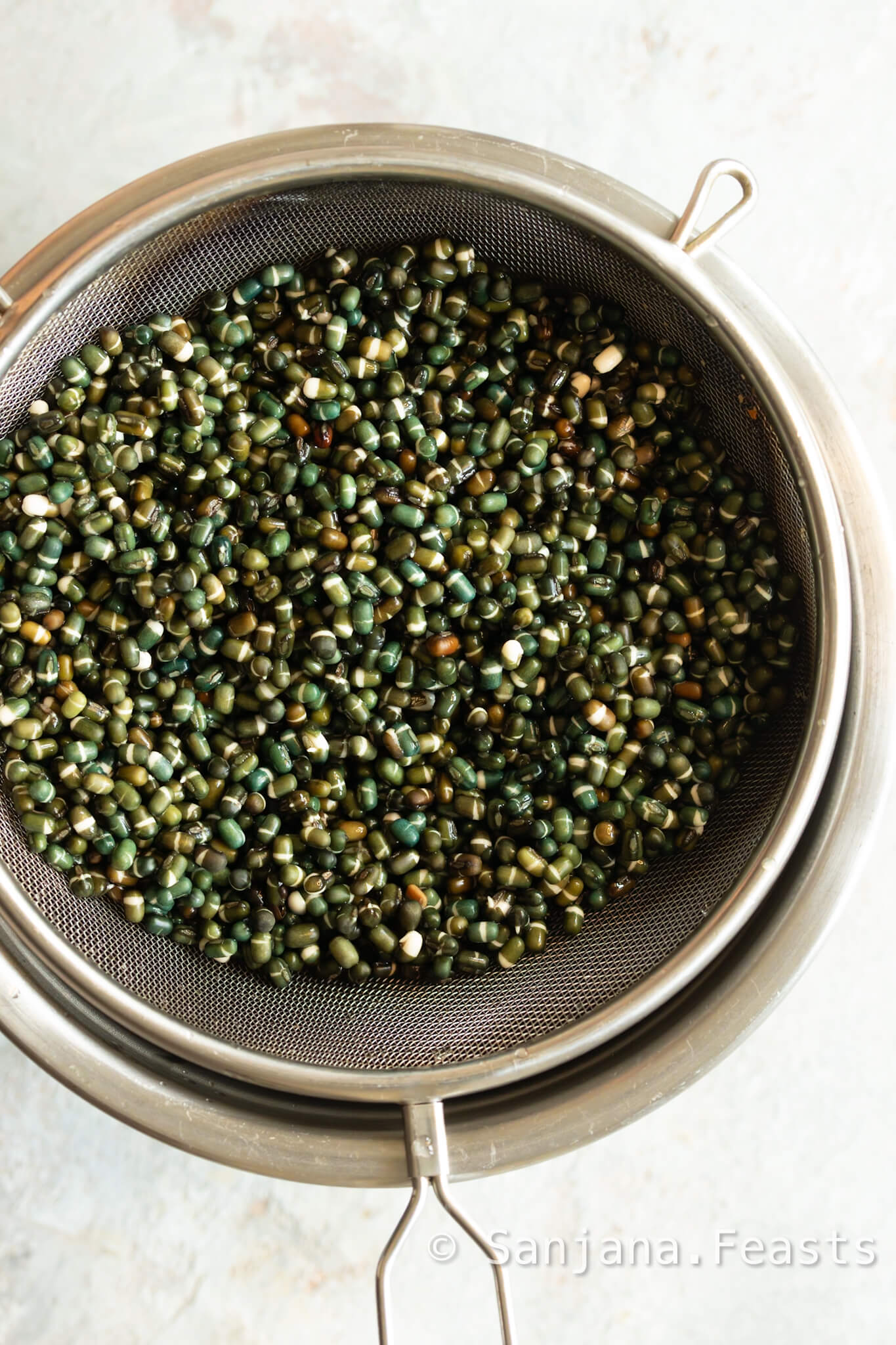 Rinse and drain the urad