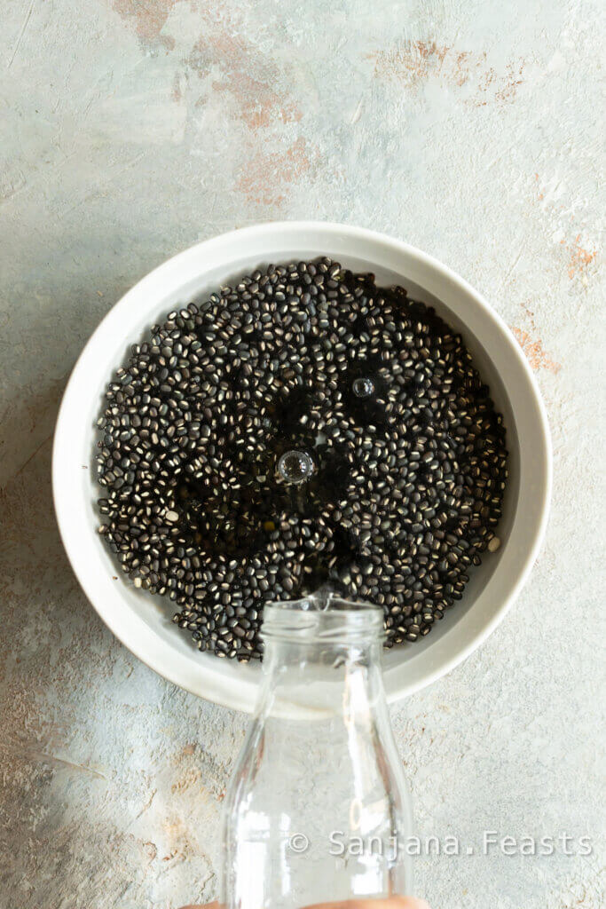 Washing dal for dal makhani