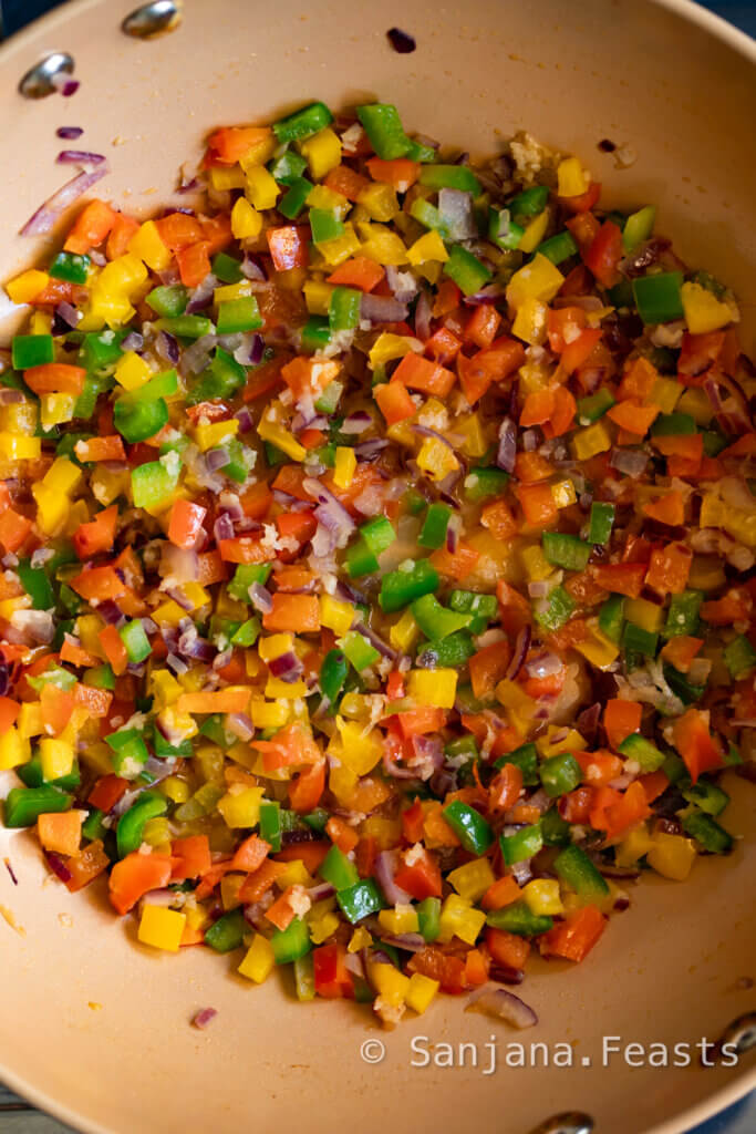 saute the onions and peppers with garlic
