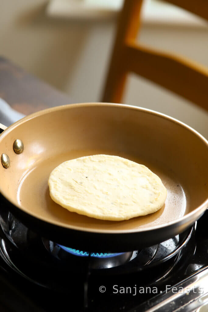 cook side 2 of the naan