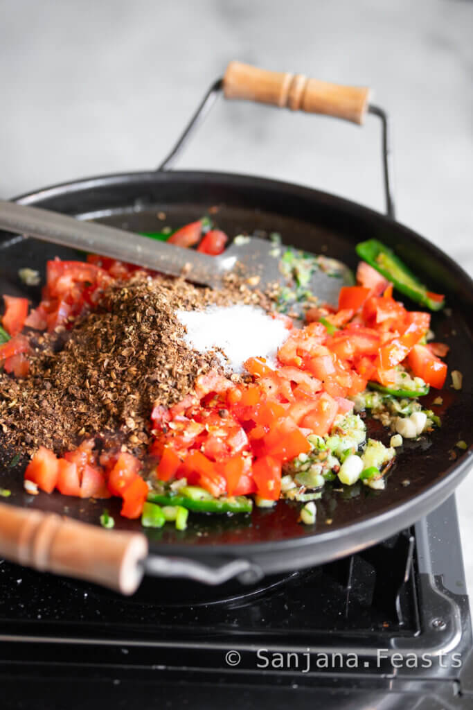 add the tomatoes and spices