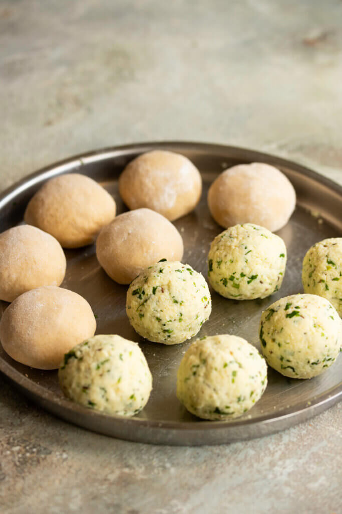 portions of paneer filling and dough