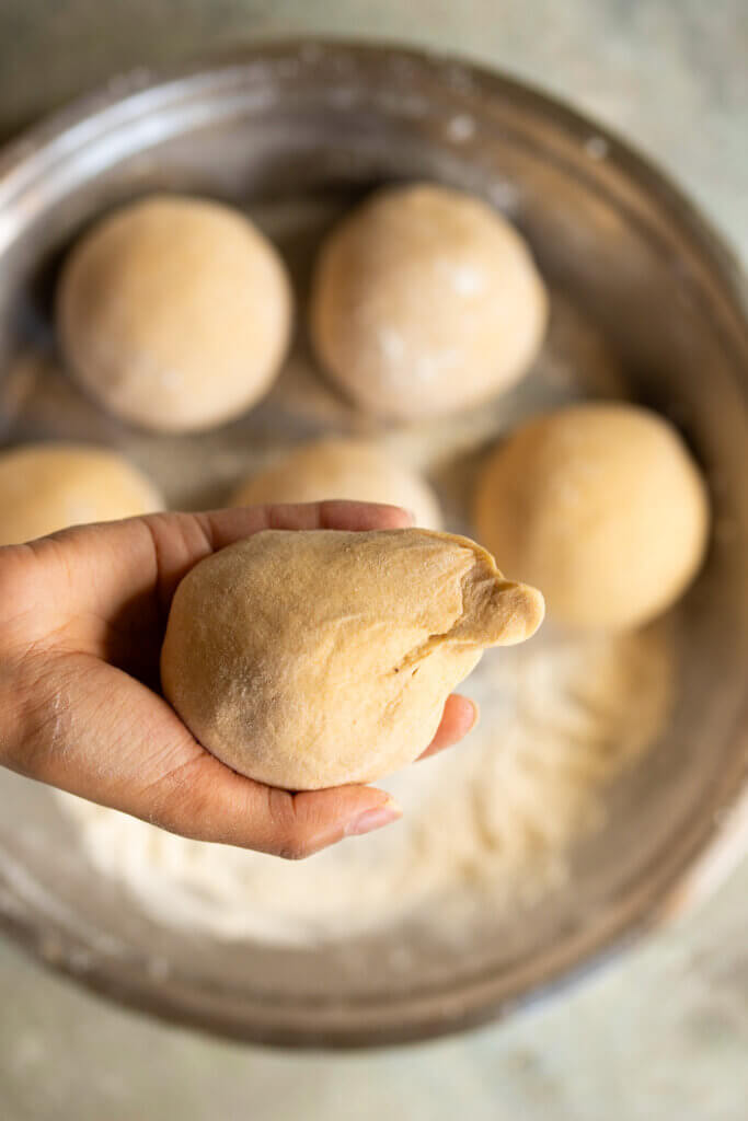 shape of paneer paratha filled dough